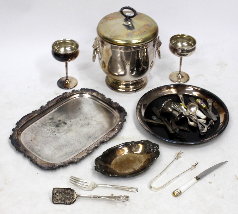 A SILVER PLATED ICE BUCKET together with further items of silver plate to include cutlery