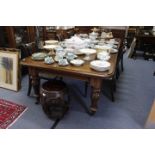 A VICTORIAN MAHOGANY EXTENDING DINING TABLE