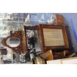 A VICTORIAN BURR WALNUT AND BOXWOOD INLAID SIDE CABINET with an oval mirrored back and a single