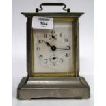 AN ANTIQUE, POSSIBLY BLACK FOREST, MUSICAL MANTLE CLOCK with a dial with Arabic numerals and