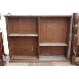 AN ANTIQUE OAK OPEN BOOKCASE with two rows of adjustable shelves, 156cm wide x 122cm high