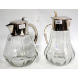 TWO WEST GERMAN WOLFF CLEAR GLASS AND SILVER PLATED LEMONADE JUGS each 25cm in height (2)