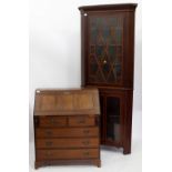 A HARDWOOD BUREAU together with an Edwardian mahogany floor standing corner cabinet (2)