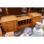 A LIGHT OAK DESK TOP with eight small drawers having turned knob handles and five pigeon holes,