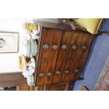 A 19TH CENTURY MAHOGANY CHEST with octagonal brass ring handles and splayed bracket feet, 101cm wide