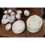 A PART WEDGWOOD DINNER SERVICE and a quantity of Staffordshire Royal Kent pattern china