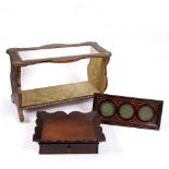 A 19TH CENTURY LEATHER COVERED BOOK STAND with bevelled glass top and standing on scroll feet and
