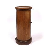 A 19TH CENTURY CYLINDRICAL OAK POT CUPBOARD with inset marble top, 41cm diameter x 83cm high