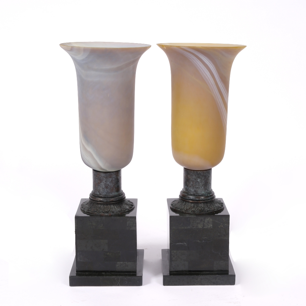 A PAIR OF CLASSICALLY INSPIRED TABLE LAMPS the glass shades with flaring rims on a faux marble