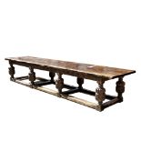 A LARGE OLD OAK 17TH CENTURY STYLE REFECTORY TABLE with plank top,