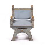 A CONTINENTAL GOTHIC REVIVAL THRONE CHAIR painted and upholstered in blue, with turned finials and
