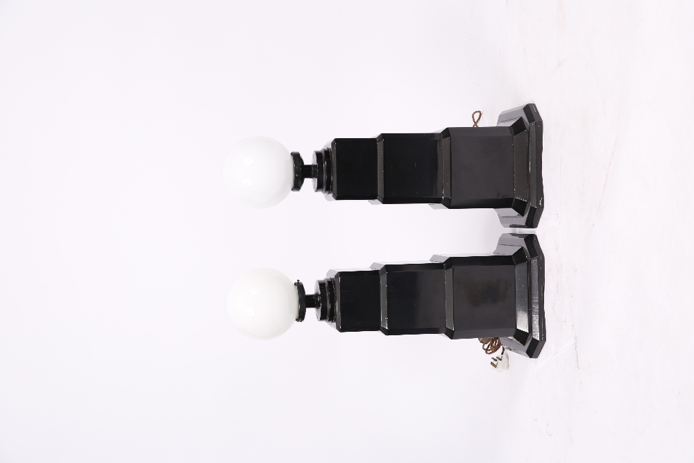 A PAIR OF ART DECO EBONISED LAMP STANDS with white glass spheres on the stepped bases, each 34cm - Image 2 of 2