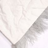 A PAIR OF OFF WHITE OR IVORY FEATHER EDGED CURTAINS gathered at the top, the drop measures 240cm x