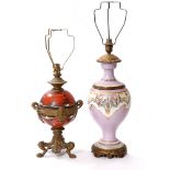AN ANTIQUE FRENCH PORCELAIN PINK GROUND TABLE LAMP with gilt metal mounts and multicoloured scroll