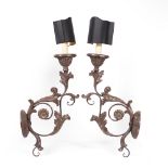 A PAIR OF PAINTED CARVED WOODEN WALL LIGHTS of scrolling acanthus leaf form, each with a black
