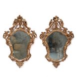 A PAIR OF 18TH CENTURY ITALIAN, POSSIBLY VENETIAN, GILT GESSO AND CARVED WOOD WALL MIRRORS the