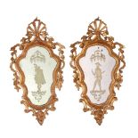 A PAIR OF ANTIQUE VENETIAN CARVED WOOD AND GILT WALL MIRRORS with pierced foliate scrolling