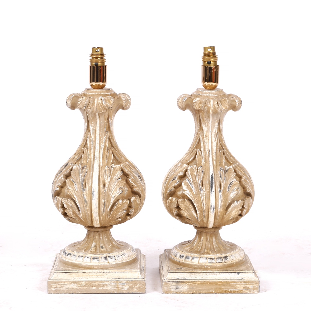 A PAIR OF CREAM PAINTED TABLE LAMPS of acanthus leaf baluster form on square bases, 48cm high (2)