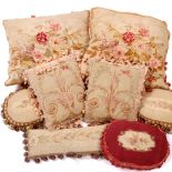 A GROUP OF EIGHT FRENCH TAPESTRY STYLE CUSHIONS all with floral decoration, the largest 40cm