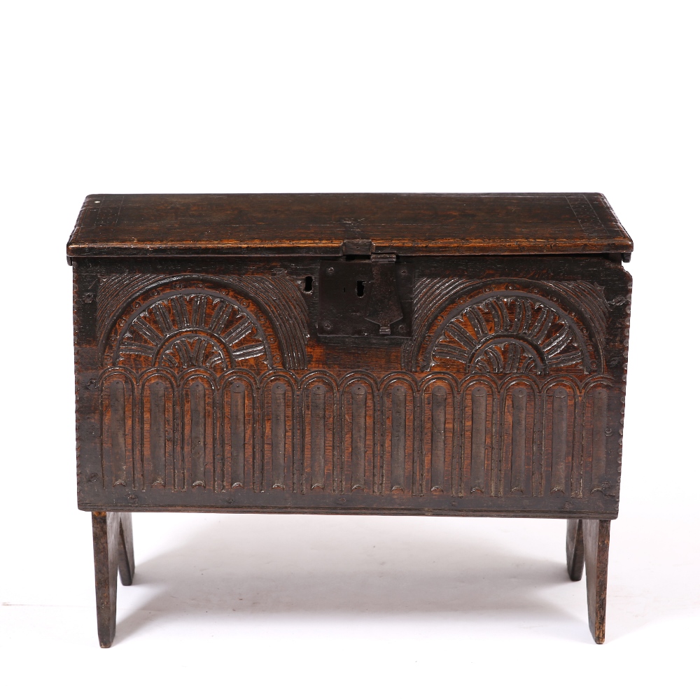 A SMALL LATE 17TH / EARLY 18TH CENTURY SIX PLANK COFFER with carved top and sides, standing on cut - Image 2 of 2