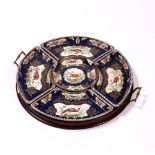 AN EDWARDIAN TURNED MAHOGANY SUPPER TRAY with Booth's Pottery compartments, decorated with exotic