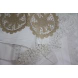 A COLLECTION OF ANTIQUE LINEN Carre Blanc table cloths with drawn threadwork and embroidery,