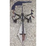 A 20TH CENTURY HAND MADE WEATHER VANE with fire arm decoration, 88cm high