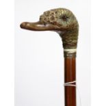 A VICTORIAN LADIES WALKING CANE the handle carved into the form of a duck with polychrome painted