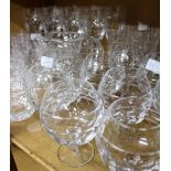 A SUITE OF CONTEMPORARY CUT GLASS WARE with eight large wine glasses, 21cm high together with two