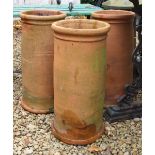 THREE TERRACOTTA CHIMNEY POTS OR PLANTERS (3)