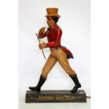 A PAINTED WOODEN ADVERTISING MODEL of Johnny Walker, 98cm in height