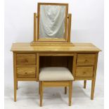 A WILLIS & GAMBIER LIGHT OAK DRESSING TABLE and stool, with detached mirror, 125cm x 140cm x 47cm