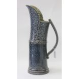 A LARGE 20TH CENTURY STUDIO POTTERY JUG with strap handle, by Walter Keeler, 43cm high approximately