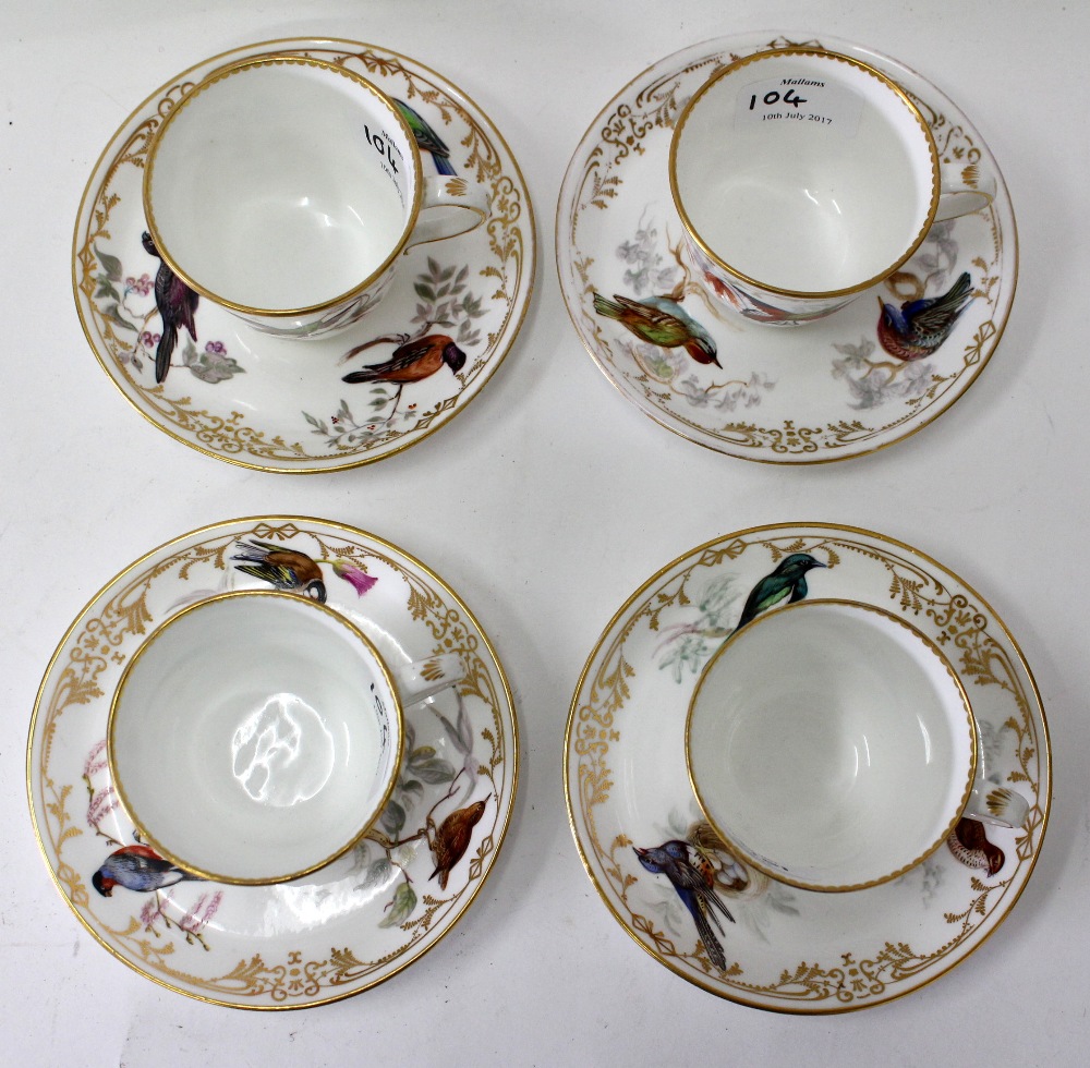 A SET OF FOUR 19TH CENTURY PORCELAIN TEA CUPS AND SAUCERS with hand painted decoration of exotic - Image 2 of 2