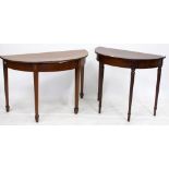 TWO LATE 19TH CENTURY MAHOGANY DEMI LUNE SIDE TABLES one with conch and lined inlaid decoration, the