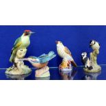 A ROYAL CROWN DERBY WOODPECKER FIGURE GROUP A Royal Worcester bone china thrush, Royal Worcester