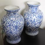 A PAIR OF PORCELAIN BLUE AND WHITE BALUSTER VASES each 40cm in height