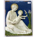AN ANTIQUE TIN GLAZED TERRACOTTA CANTAGALLI PLAQUE depicting the virgin and child, stamped with a