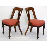 A SET OF FIVE VICTORIAN OAK DINING CHAIRS with red upholstered seats, together with a mahogany