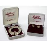 A LONDON SILVER SAINT NINIANS ISLE TREASURE REPLICA BROOCH and a pair of earrings, boxed (2)