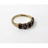 A 9CT YELLOW GOLD AMETHYST AND DIAMOND CHIP RING size N/J