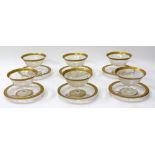 A SET OF TEN 19TH CENTURY GOLD PAINTED AND ETCHED DESSERT BOWLS with matching plates and one spare