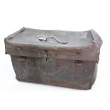 A VINTAGE LEATHER SUITCASE OR TRUNK with tooled edges, 74cm x 39cm x 43cm