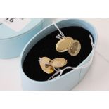 A PAIR OF 9CT YELLOW GOLD CUFFLINKS with engraved decoration, overall weight 5.3 grams