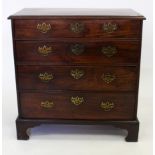 A 19TH CENTURY MAHOGANY CHEST OF FOUR LONG DRAWERS with cross banded top and standing on bracket