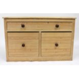 A MID TO LATE 20TH CENTURY COUNTRY PINE CHEST OF THREE DRAWERS 125cm x 80cm x 69cm