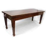 A LARGE EDWARDIAN MAHOGANY SIDE TABLE reputedly by Shoolbred, with rectangular top and standing on