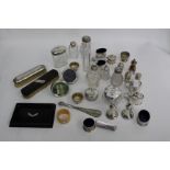 A COLLECTION OF SMALL SILVER AND SILVER MOUNTED ITEMS to include bottles and jars, brushes,