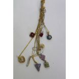 A COLLECTION OF VARI GEM-SET PENDANT NECKLACES to include a peridot and diamond set pendant