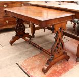 A 19TH CENTURY WALNUT LIBRARY TABLE with pierced splat supports united by a turned stretcher,